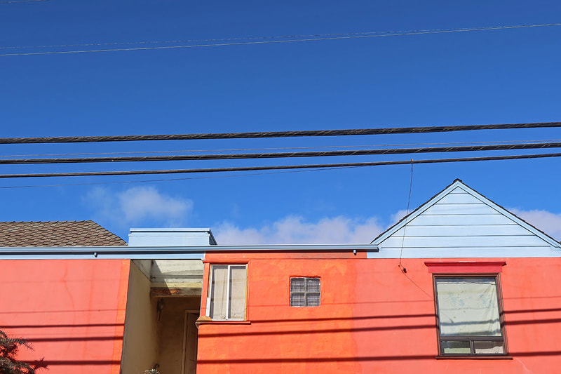 orange house blue sky