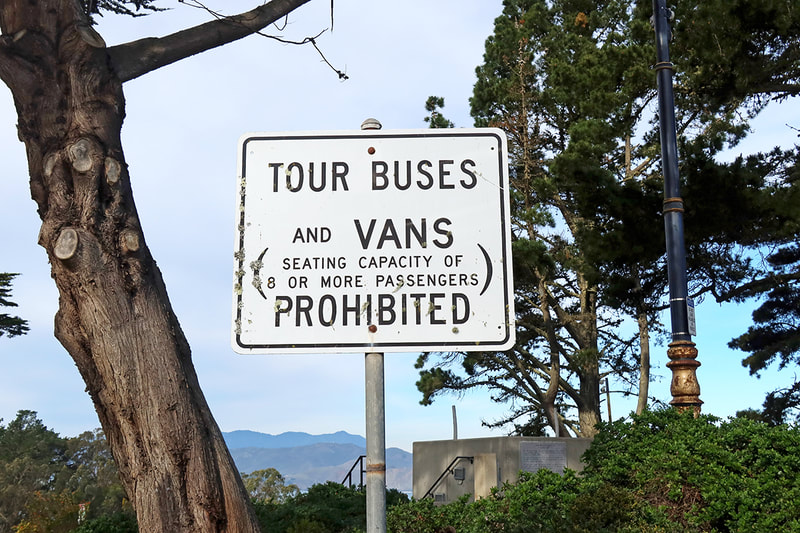 Tour buses and vans over 8 passengers prohibited 