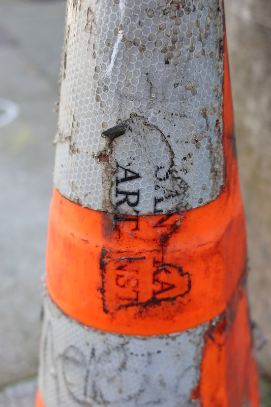 caution cone with sfai sticker
