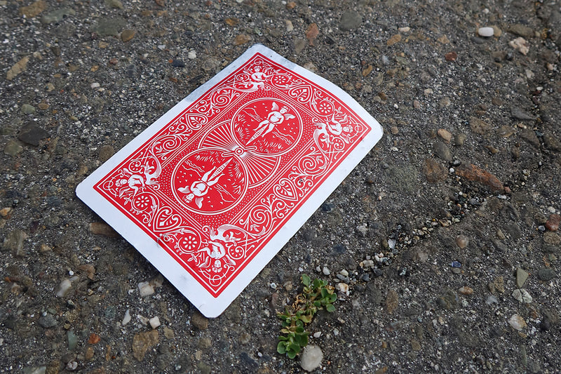 playing card on pavement