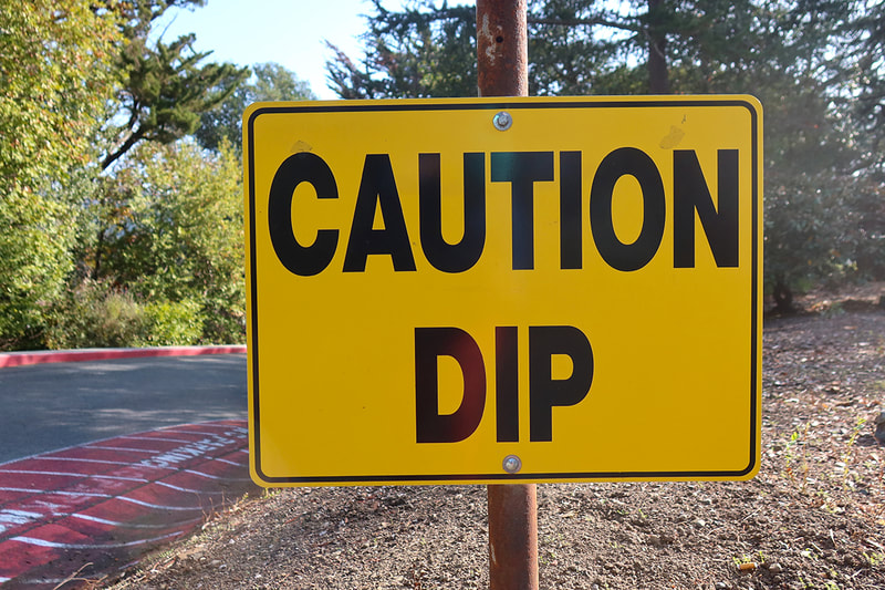 caution Dip sign