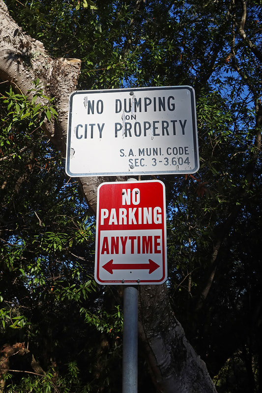 no dumping sign in trees