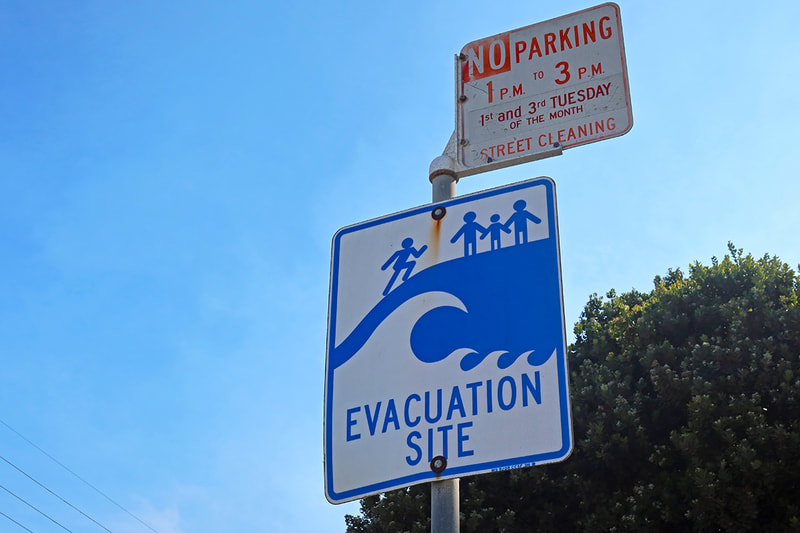 Evacuation site sign