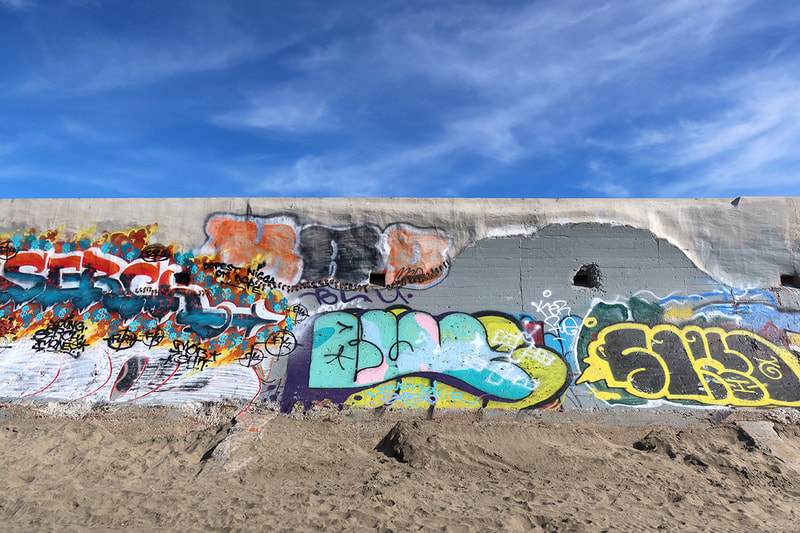 Graffiti on beach wall