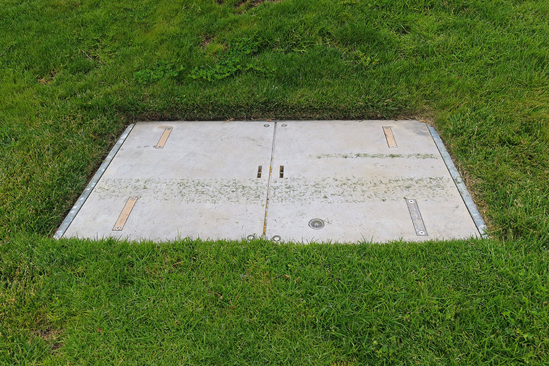 grass with cement hatch