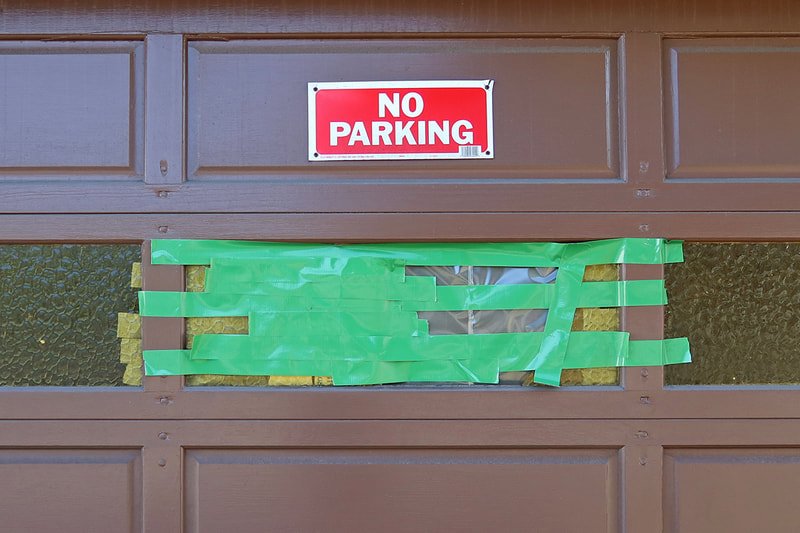 green tape on garage door
