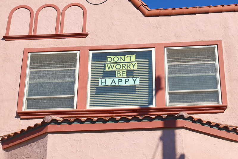 dont worry be happy sign in window
