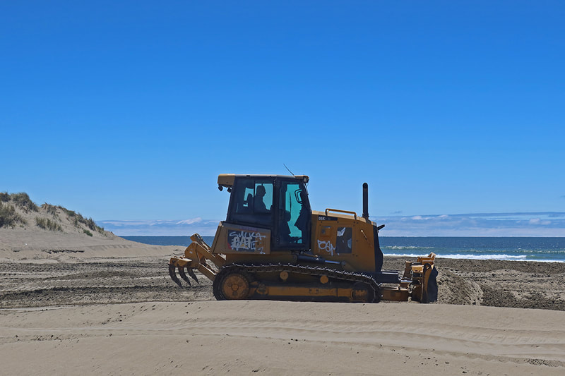 bulldozing sand dunes