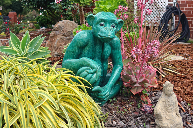 green ceramic monkey