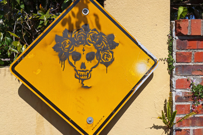 skull painted on sign
