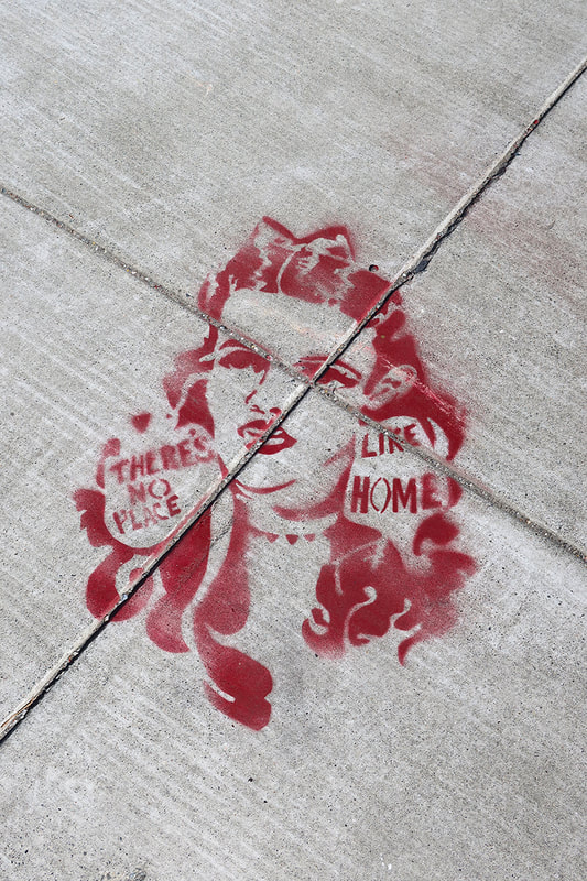 Dorothy stencil on sidewalk