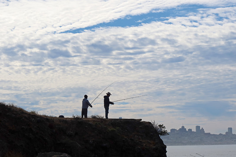 fishermen on a cliff
