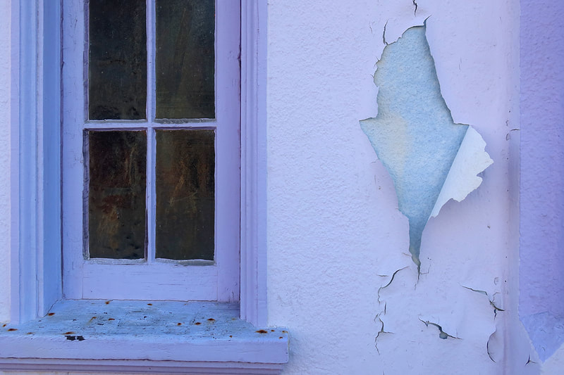 purple paint on window and wall