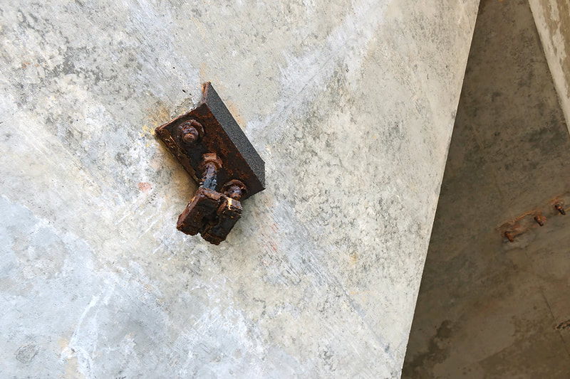 rusty hardware on cement