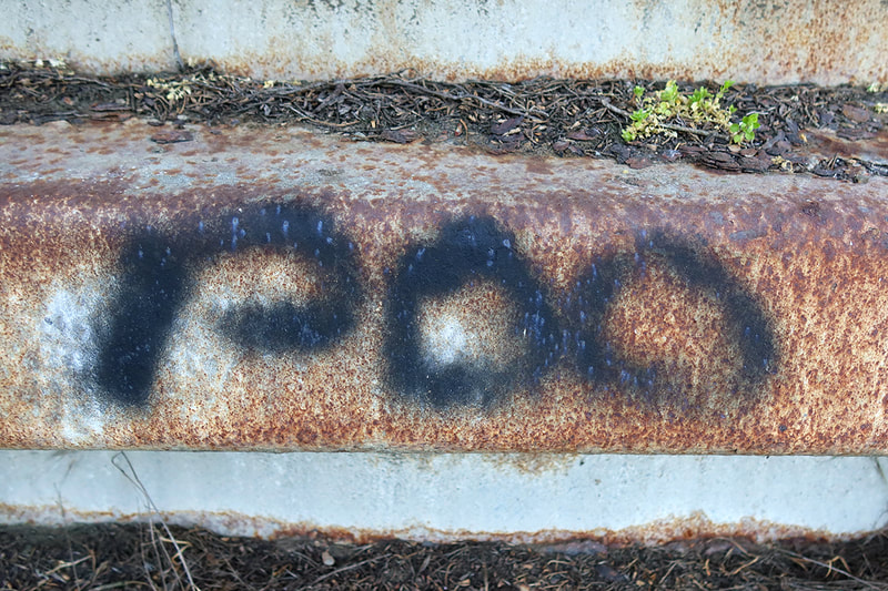 poo written in spraypaint