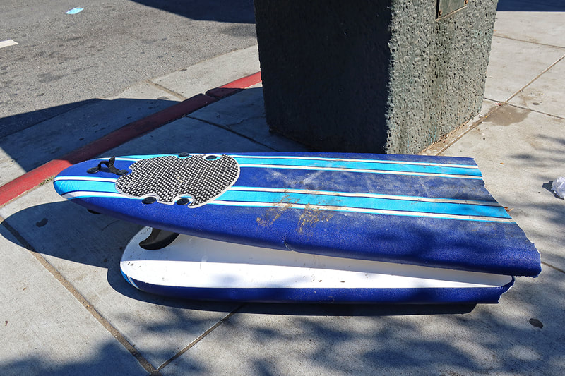 broken surfboard