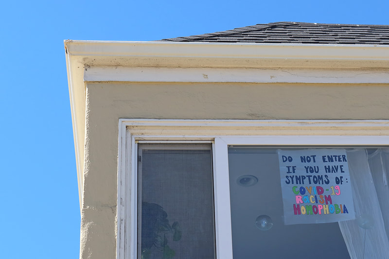 sign in house window