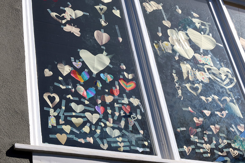 Hearts taped on window
