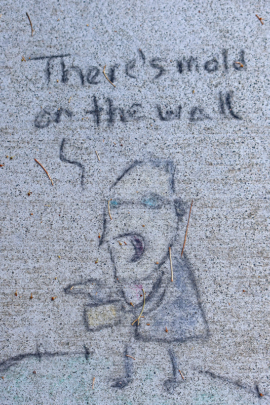 Cartoon like drawing on sidewalk