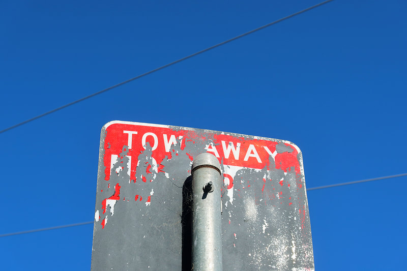 tow away sign