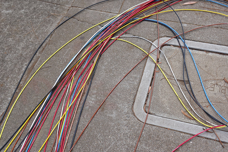 wires on sidewalk